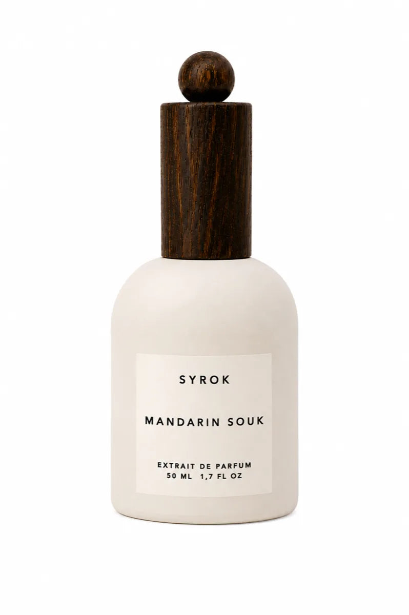 Flacone SYROK Mandarin Souk su fondo chiaro